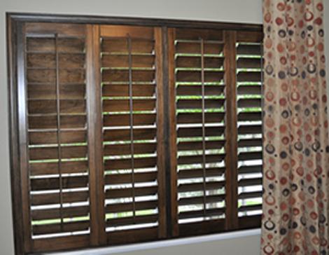 Shutters on windows Solar Screens save you money